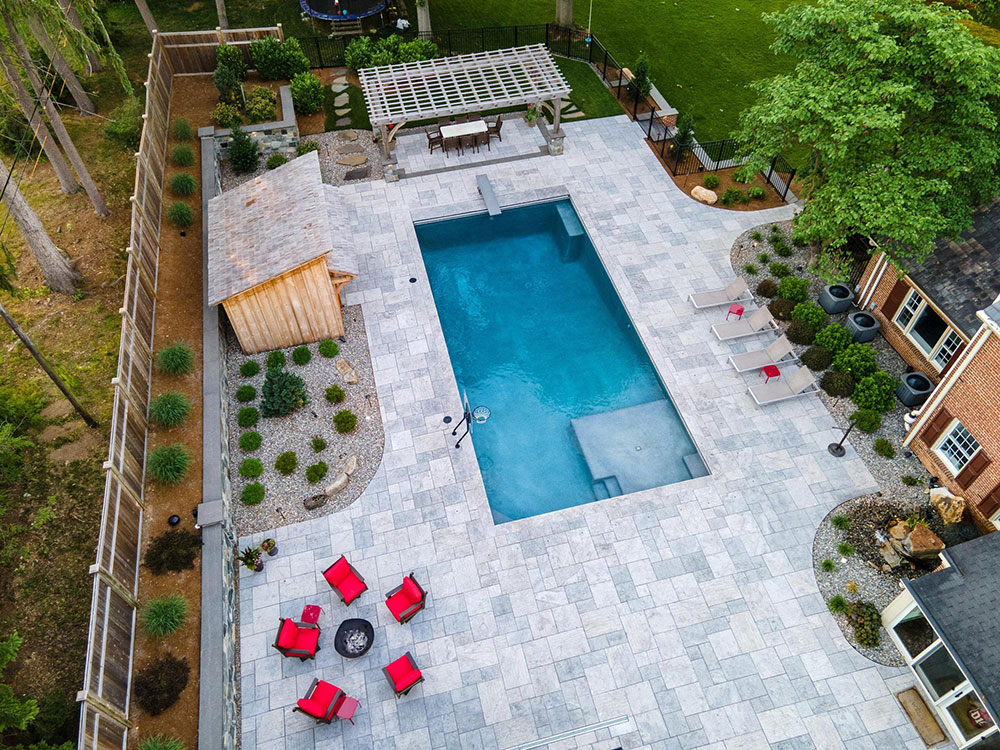 hardscape with pool aerial view